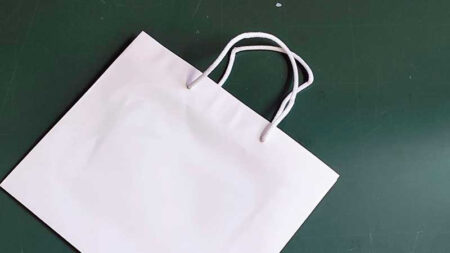 Shopper in carta uso mano bianca manico in cotone